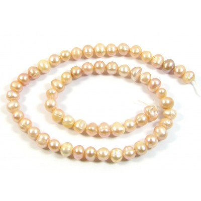 1 Strand Peach Potato Shape Freshwater Pearls approx. 5 mm.