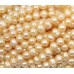 1 Strand Peach Potato Shape Freshwater Pearls approx. 8 mm.
