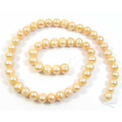 1 Strand Peach Potato Shape Freshwater Pearls approx. 8 mm.