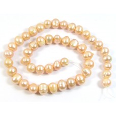 1 Strand Peach Potato Shape Freshwater Pearls approx. 7 mm.