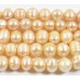 1 Strand Peach Potato Shape Freshwater Pearls approx. 7 mm.