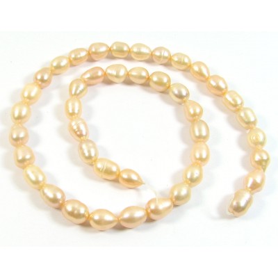 1 Strand Peach Rice Shape Freshwater Pearls approx. 7 mm.