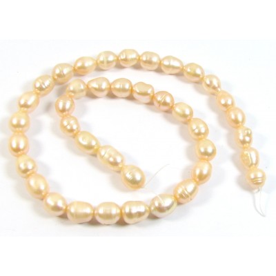 1 Strand Peach Rice Shape Freshwater Pearls approx. 10 mm.