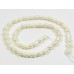 1 Strand White 5-6mm Rice Freshwater Pearls.