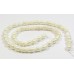 1 Strand White 5-6mm Rice Freshwater Pearls.