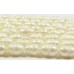 1 Strand White 5-6mm Rice Freshwater Pearls.